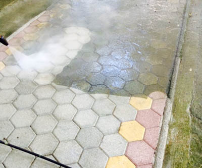 Washing of stones and other surfaces only with water using the high pressure pump.
